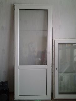 Дверь балконная пластиковая 215х850