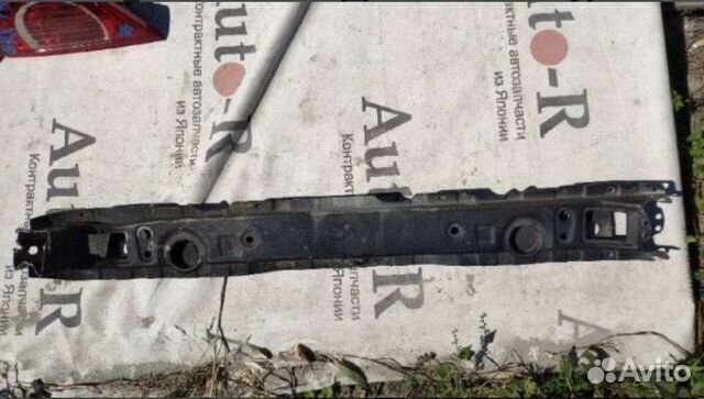 Нижняя поперечная балка под радиатором