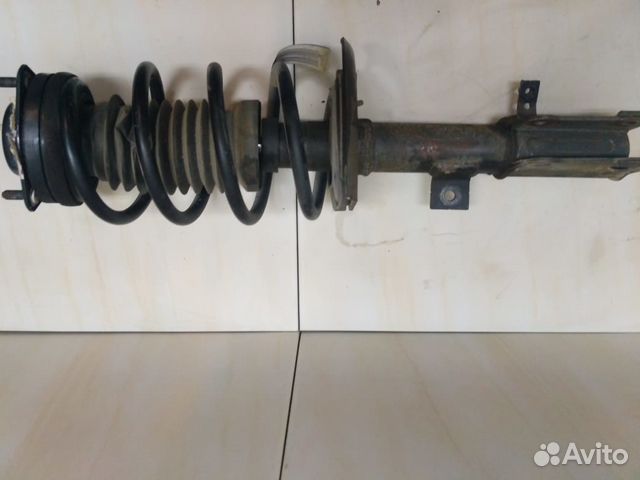 Стойка амортизатора передняя Крайслер Додж Стойка амортизатора передняя Крайслер Додж