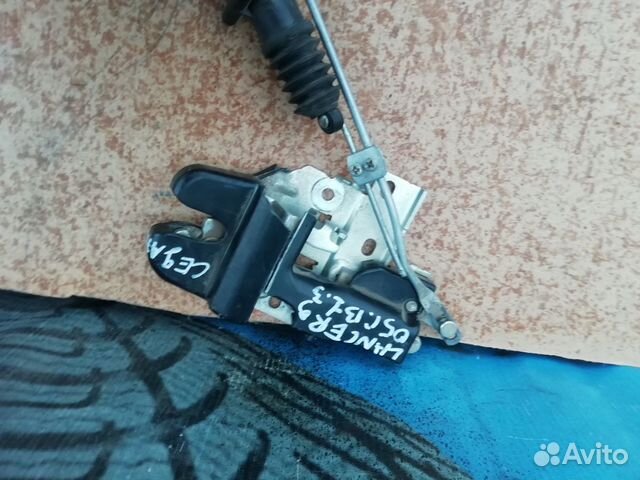 Замок крышки багажника Mitsubishi Lancer 1.3 мт 20