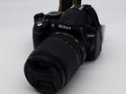 Зеркальный фотоаппарат nikon D3100 с объективом ni объявление продам