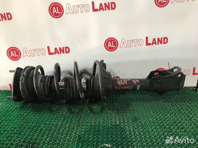 Стойка передняя левая Toyota Vitz SCP10