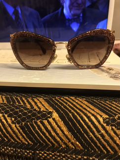 Солнцезащитные очки Miu Miu