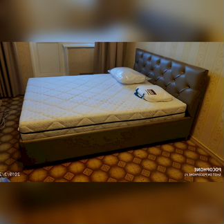 Кровать с подъемным механизмом