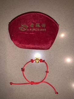 Красная нить с фигуркой мышки